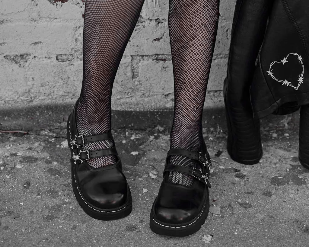 Black TUKskinâ„¢ 2-Skull Buckle Mary Jane
